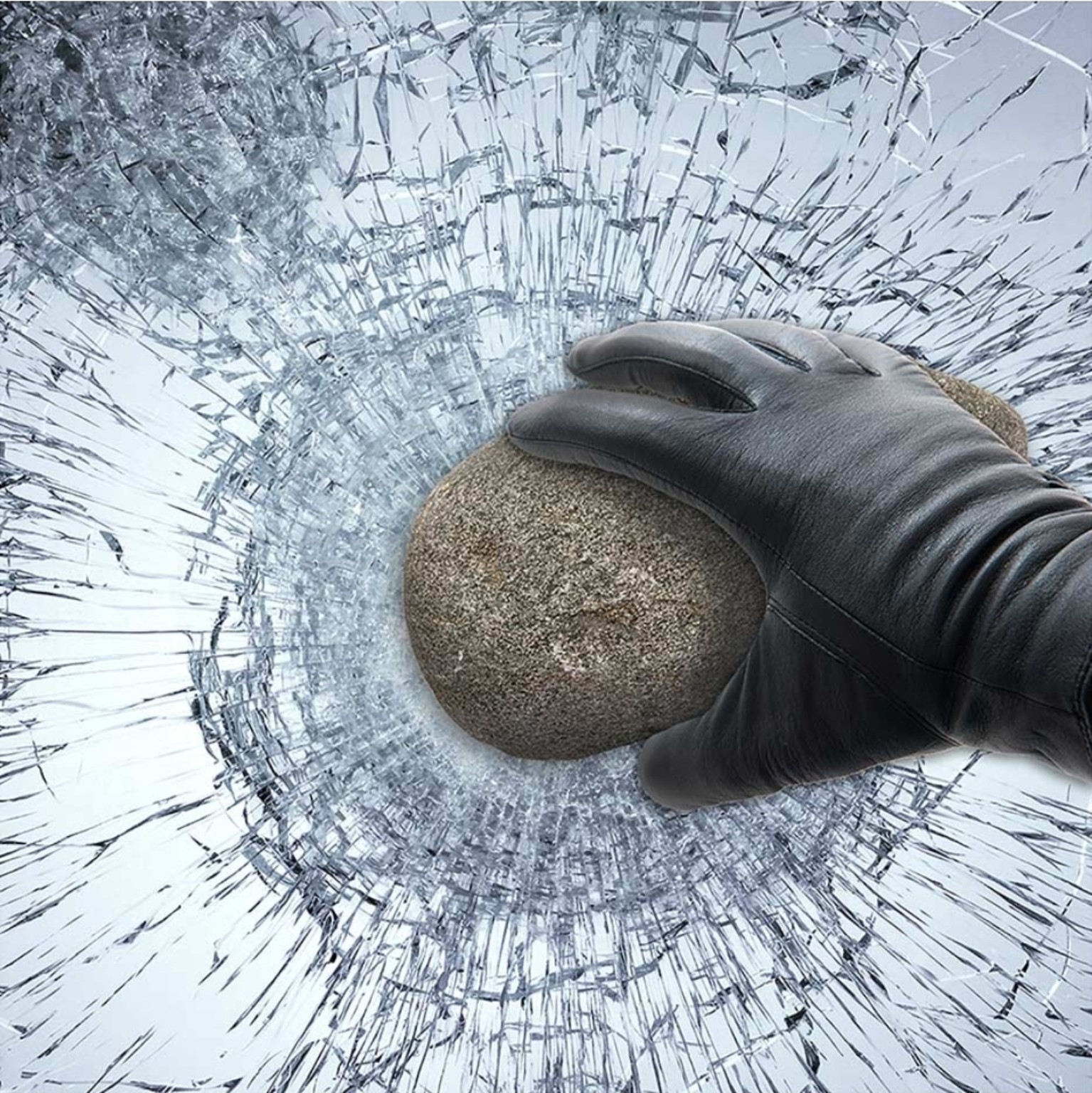 Safety and security film holding broken glass together